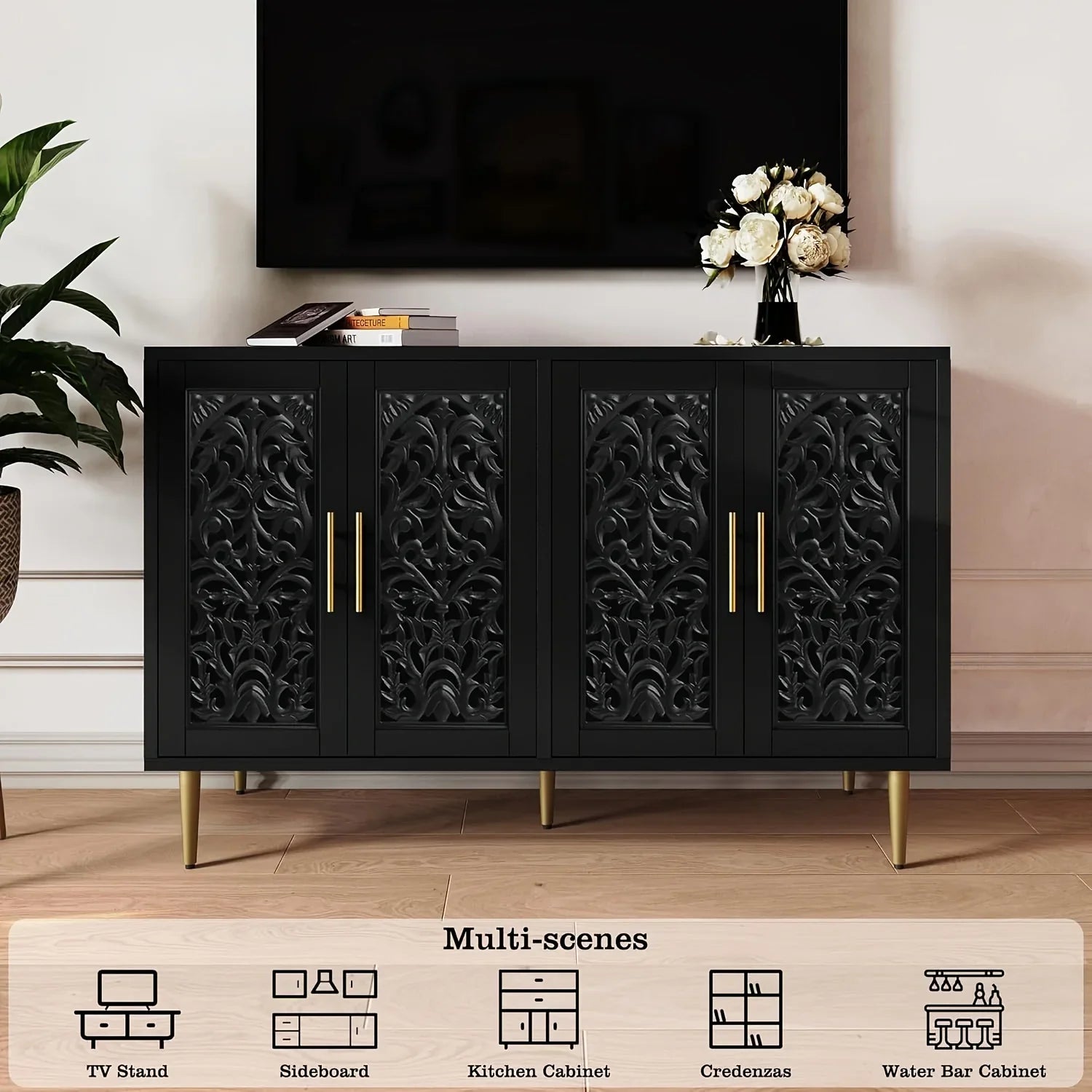 Black decorative cabinet with gold accents in a room setting.