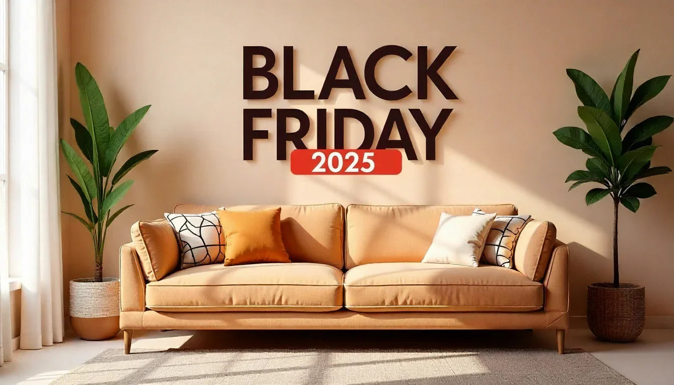 Modern living room with beige sofa, decorative pillows, green plants, and Black Friday 2025 wall text