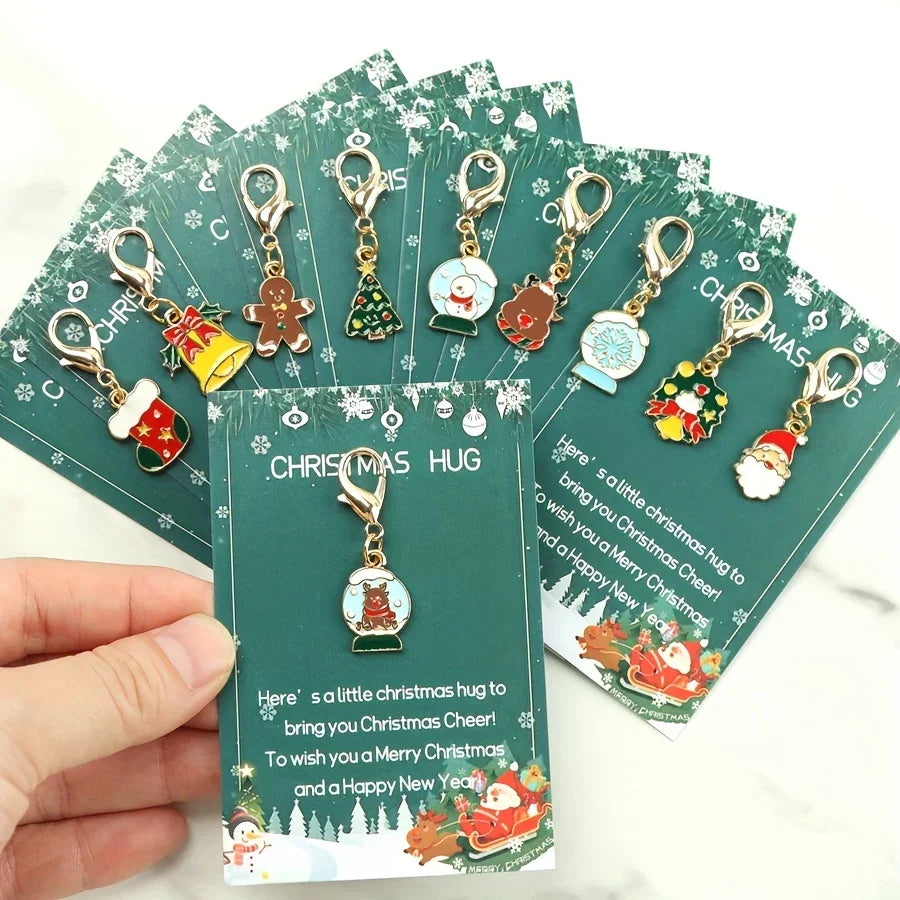 10 Christmas Themed Keychains, with Designs of Santa Claus, Snowman, Gingerbread Man, Bells, Reindeer, Etc., with Christmas Hug Greeting Card Blessings. This Is a Small Christmas Hug, Suitable As a Holiday Gift for Relatives House Of Avana