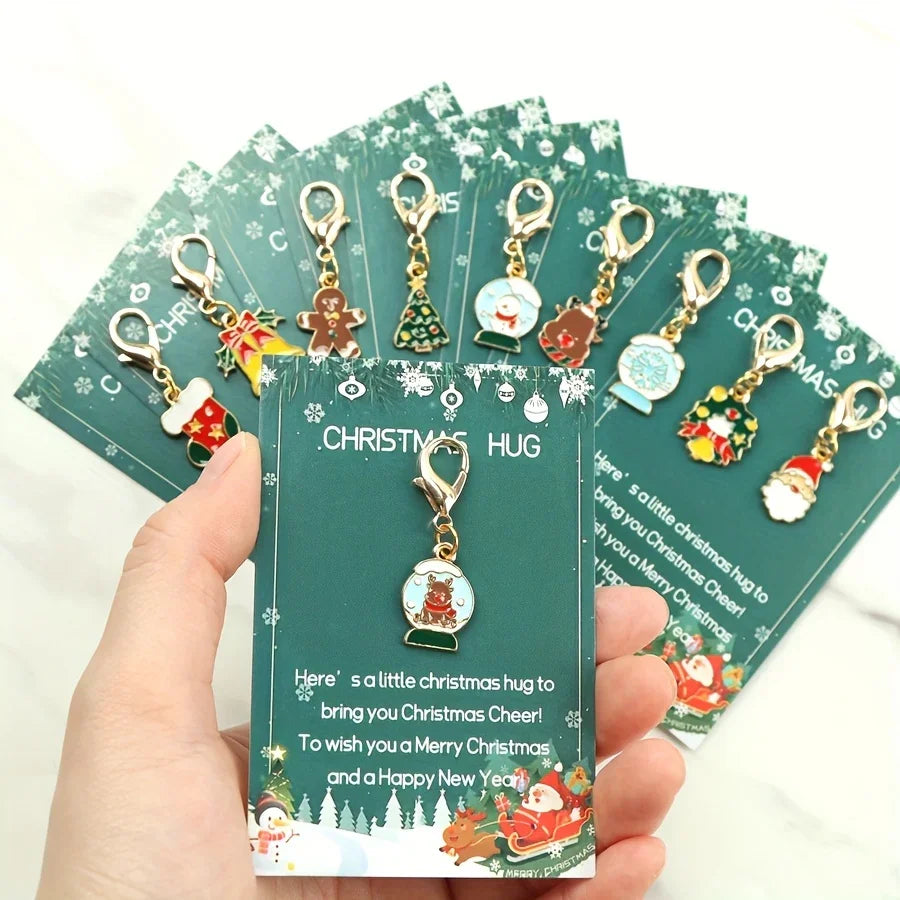 10 Christmas Themed Keychains, with Designs of Santa Claus, Snowman, Gingerbread Man, Bells, Reindeer, Etc., with Christmas Hug Greeting Card Blessings. This Is a Small Christmas Hug, Suitable As a Holiday Gift for Relatives House Of Avana