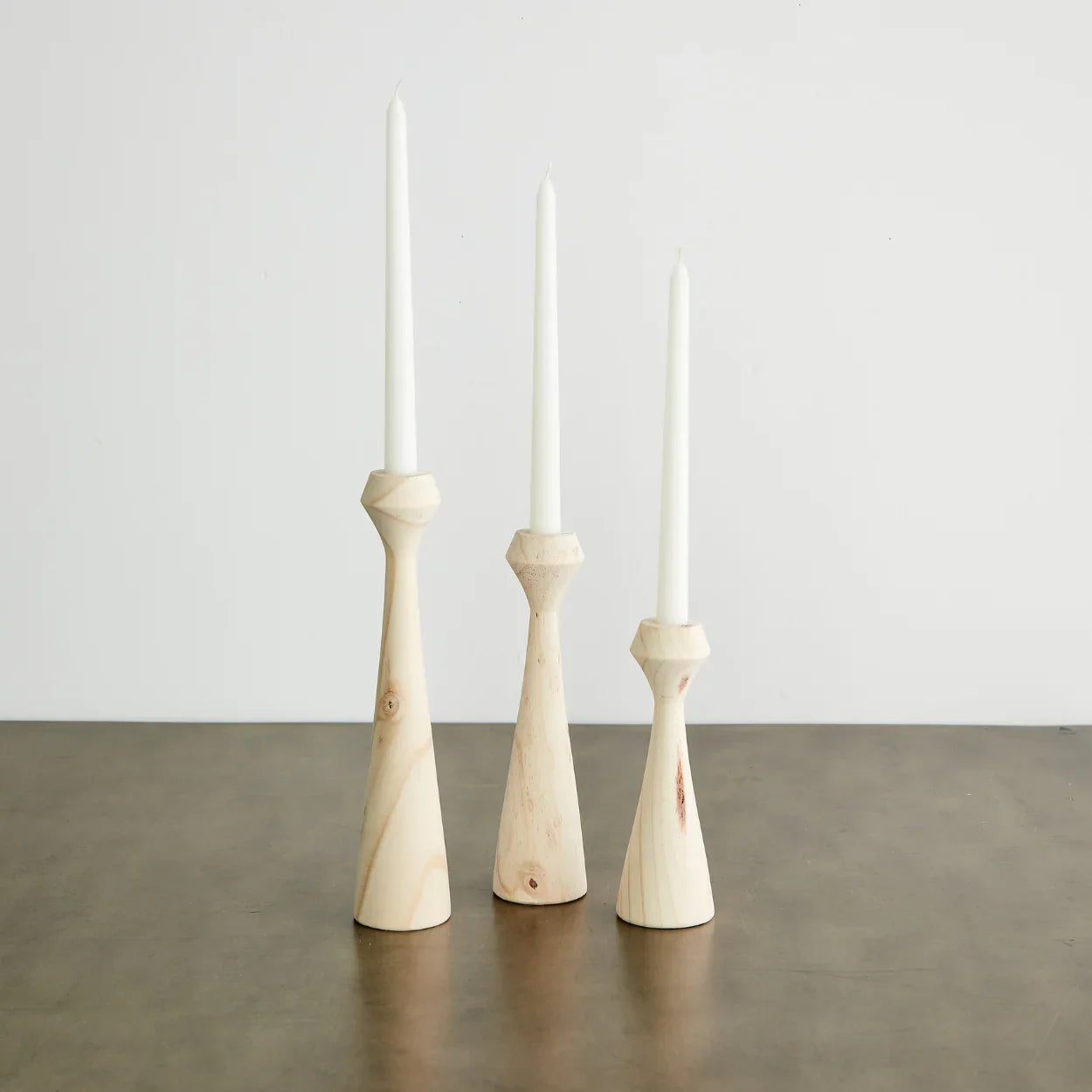 Tapered Diamond Wood Candle Holder in Cognac, Natural and Espresso Kanju Interiors