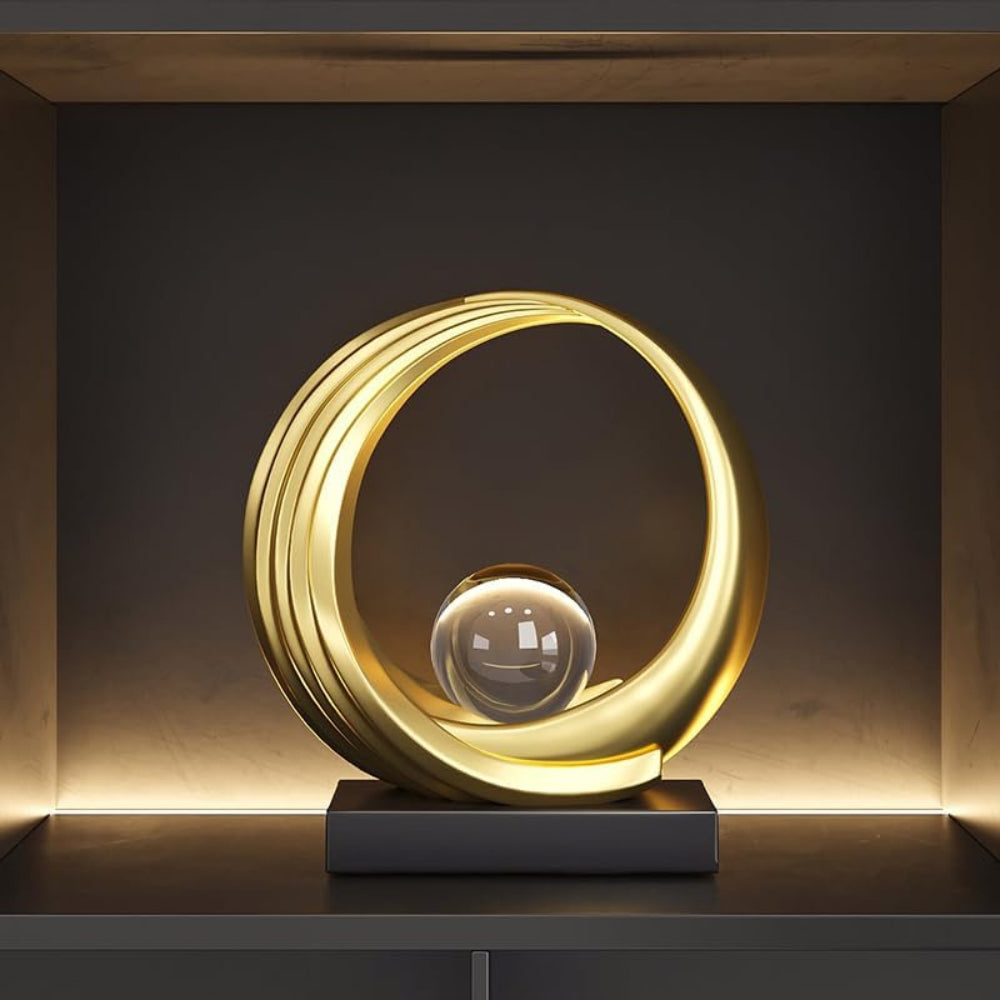 Circle Sculpture with Clear Ball – Gold Resin [[SKU:HOA-SCU-546]]