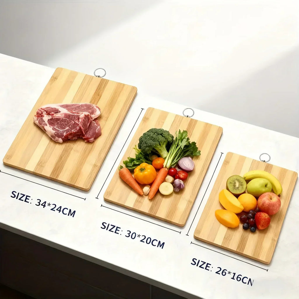 Three rectangular carbonized bamboo cutting boards in small, medium, and large sizes for kitchen meal preparation.