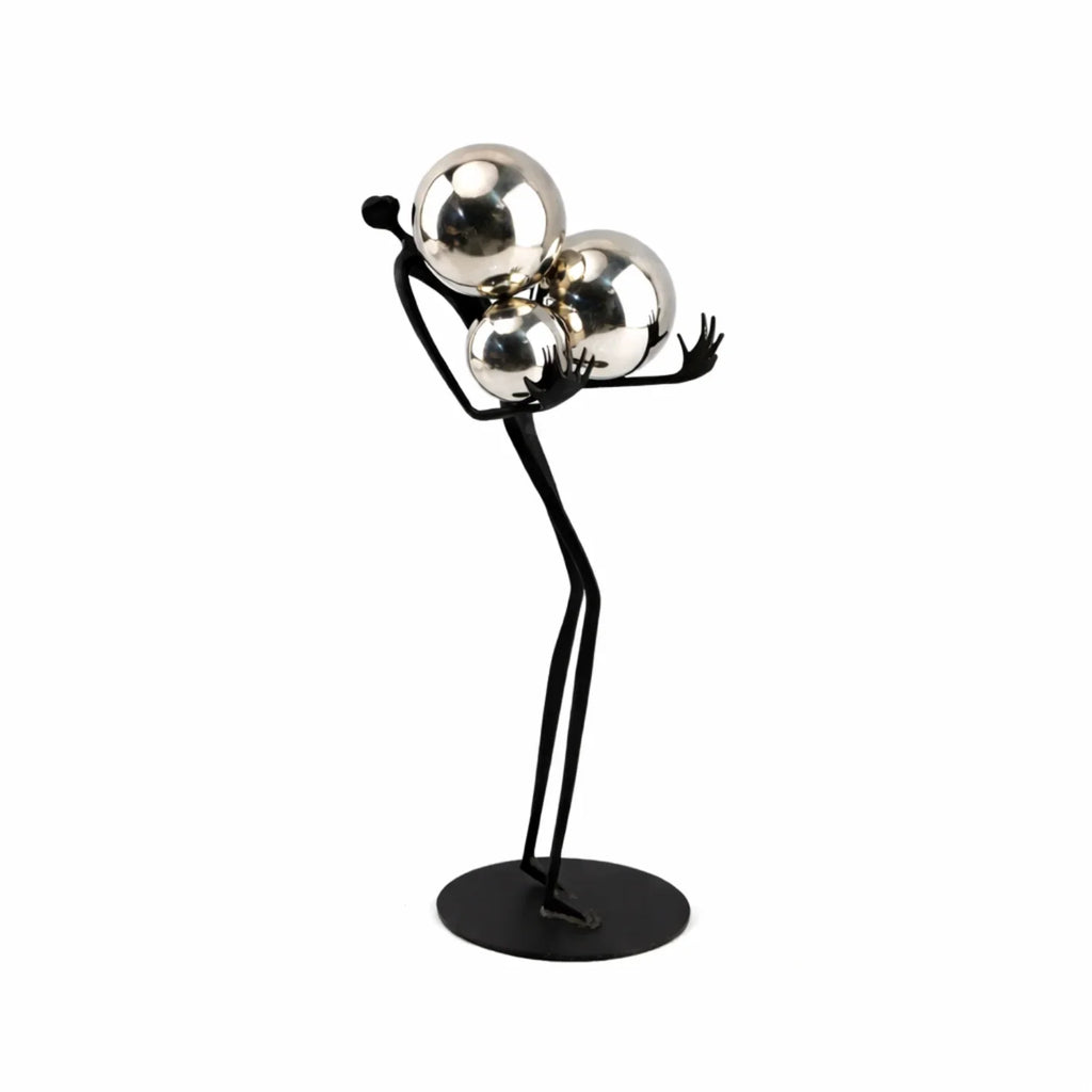 Human Sculpture with Decorative Metal Balls