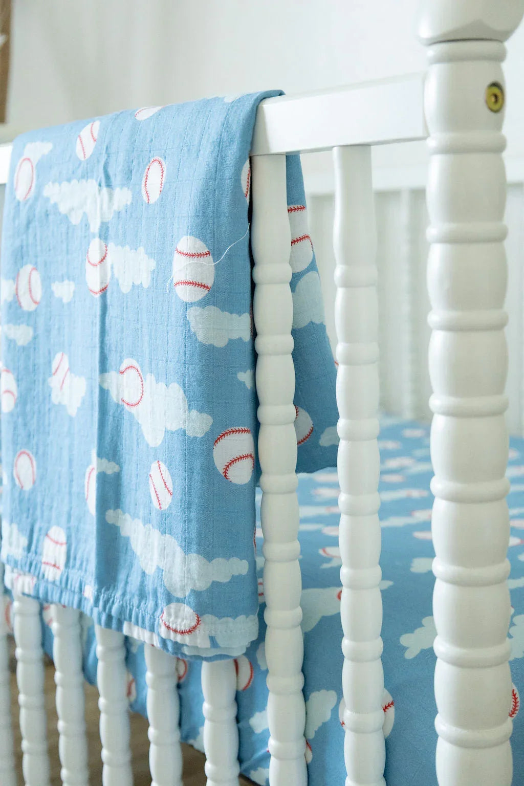 Organic Bamboo Cotton Muslin Crib Sheet in Baseballs in the Sky Cradle Comforts Co.
