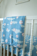 Organic Bamboo Cotton Muslin Swaddle Blanket in Baseballs in the Sky Cradle Comforts Co.