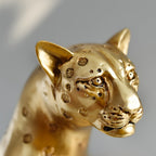Leopard on Tree Stump Sculpture – Gold Resin [[SKU:HOA-SCU-545]]