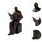 Reader Bookend Sculpture – Black Resin [[SKU:HOA-BKE-001]]