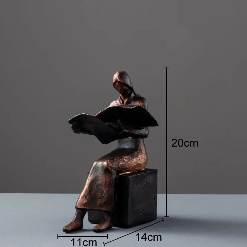 Small Reader Bookend Sculpture – Black Resin [[SKU:HOA-BKE-002]]