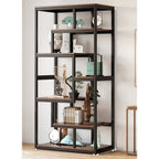 80cm industrial bookshelf with black steel frame and staggered wood-finish shelves in a modern room setting.