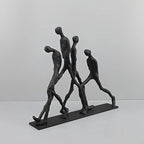 Modern Metal Sculpture - Minimalist Ascending Figures, angled view - House Of Avana