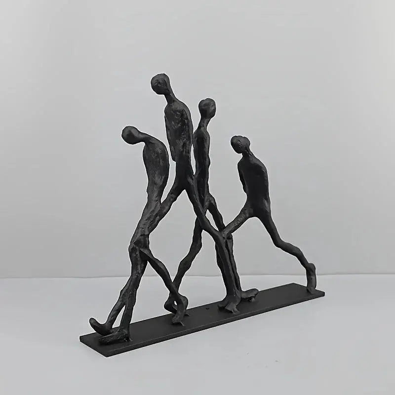 Modern Metal Sculpture - Minimalist Ascending Figures, angled view - House Of Avana