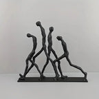 Modern Metal Sculpture - Minimalist Ascending Figures, angled view - House Of Avana