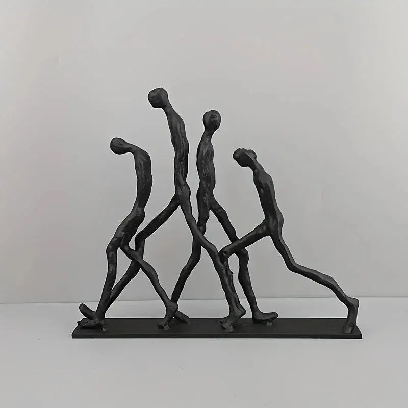 Modern Metal Sculpture - Minimalist Ascending Figures, angled view - House Of Avana