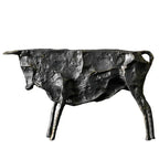 Black bronze bull statue with textured metallic finish and stylized form for elegant home decor display