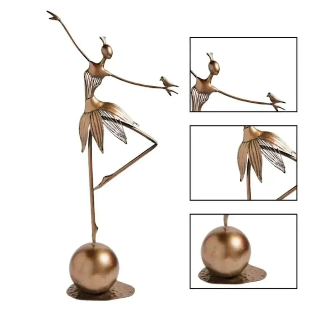 Bronze dancing ballerina metal sculpture with abstract pose balancing on one leg holding a small bird decorative figurine