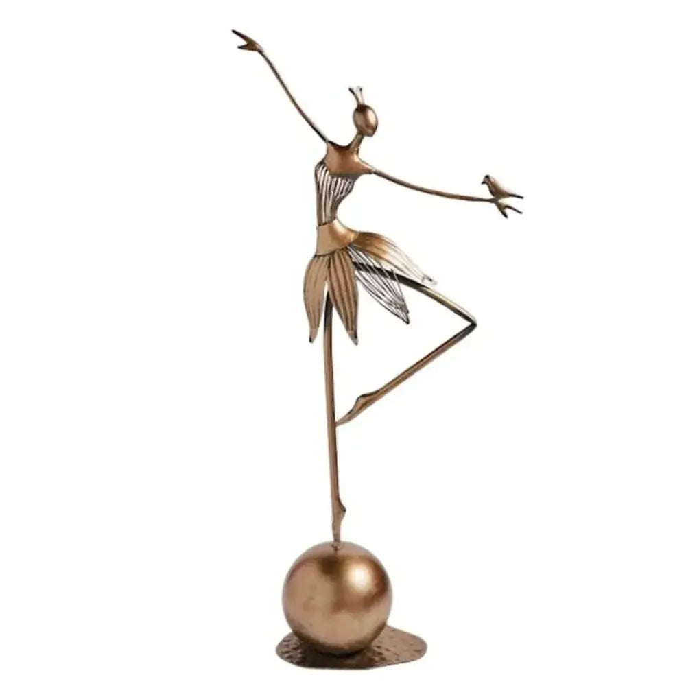 Bronze abstract dancing ballerina metal sculpture with delicate leaf-like skirt and small bird on outstretched arm