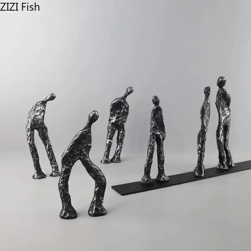 Set of six abstract metal figures sculpture in black cast iron with dark gray and silver textured finishes