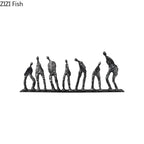 Set of seven abstract metal figures in matte black textured cast iron sculpture for modern decor