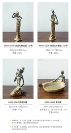 African Figurine - Golden Sculpture Storage, in-use display - House Of Avana [[SKU:HOA-SCU-456]]