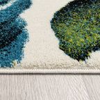 Artful Area Rug with Artful Watercolor Roses in Blue, side view - House Of Avana