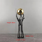 Black Iron Figure Sculpture with Silver Sphere for Your Modern Home