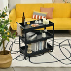 Black serving cart with items in front of a yellow couch