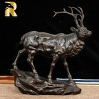 Bronze deer buck decorative sculpture with detailed antlers and muscular form on rocky base for living rooms