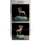 Bronze ram decorative sculpture with detailed curled horns and muscular build on textured rocky green patina base