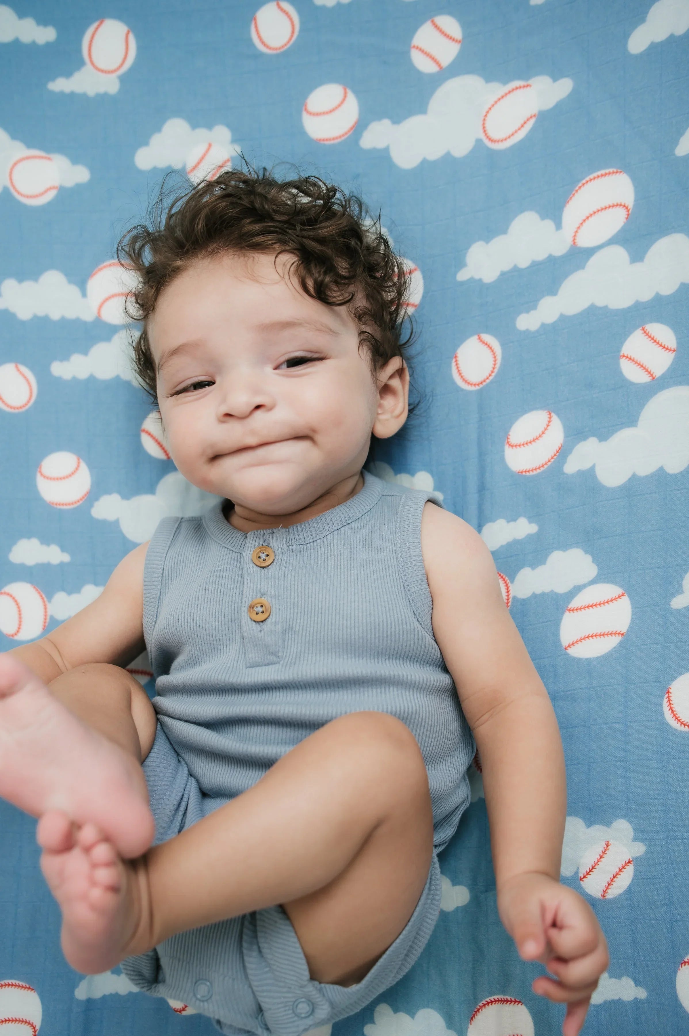 Organic Bamboo Cotton Muslin Crib Sheet in Baseballs in the Sky Cradle Comforts Co.