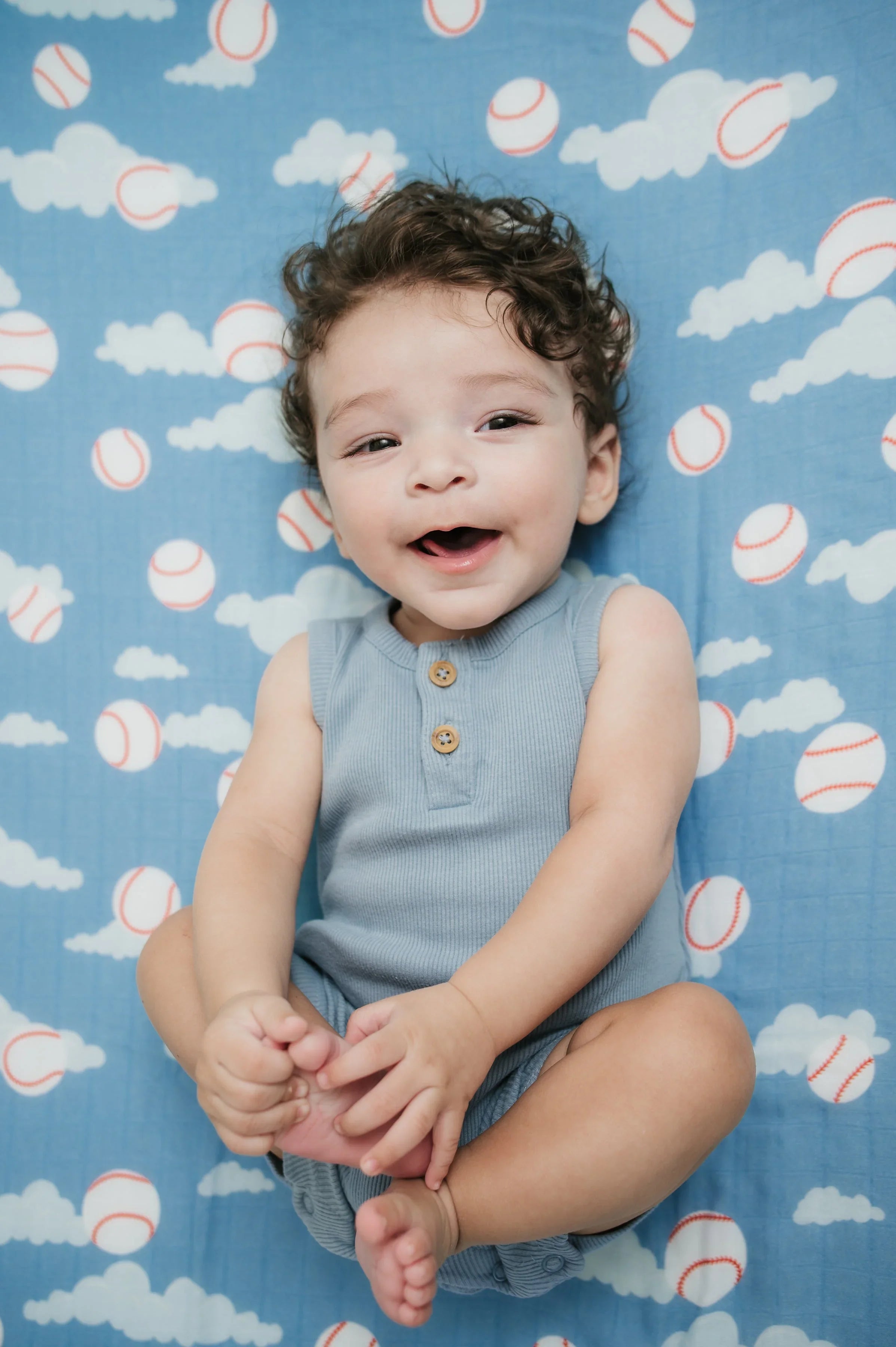 Organic Bamboo Cotton Muslin Crib Sheet in Baseballs in the Sky Cradle Comforts Co.