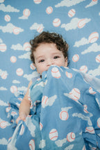 Organic Bamboo Cotton Muslin Crib Sheet in Baseballs in the Sky Cradle Comforts Co.