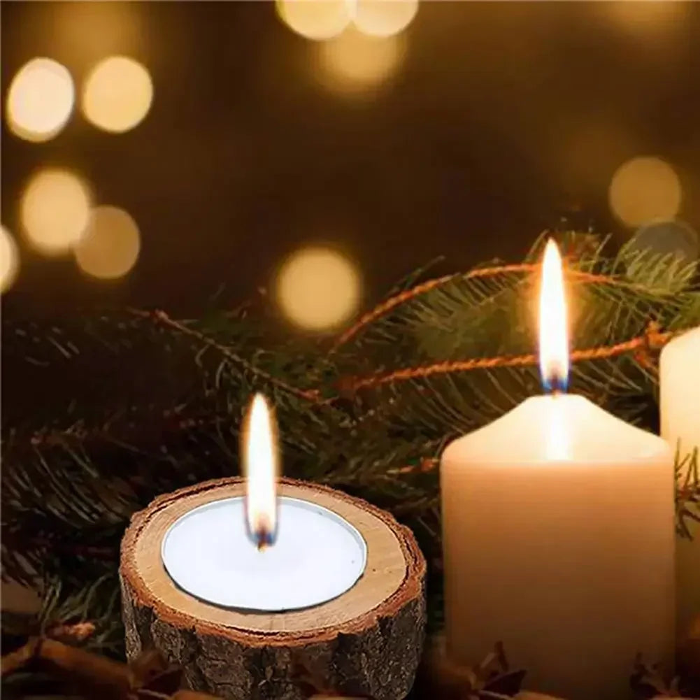 A rustic wooden mini candle holder with natural bark texture holding a white tea light candle