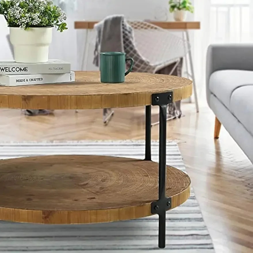 Rustic two-tier boho wooden round coffee table with natural wood shelves and black metal pipe legs for living room