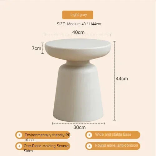 Light gray compact size coffee table stool with smooth rounded top and wide conical eco-friendly pe plastic base for living room