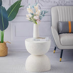 White speckled marble small coffee table designed as a modern living room side table with two stacked rounded sections