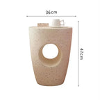 Beige speckled concrete coffee table marble small with circular cutout and minimalist design for living room use
