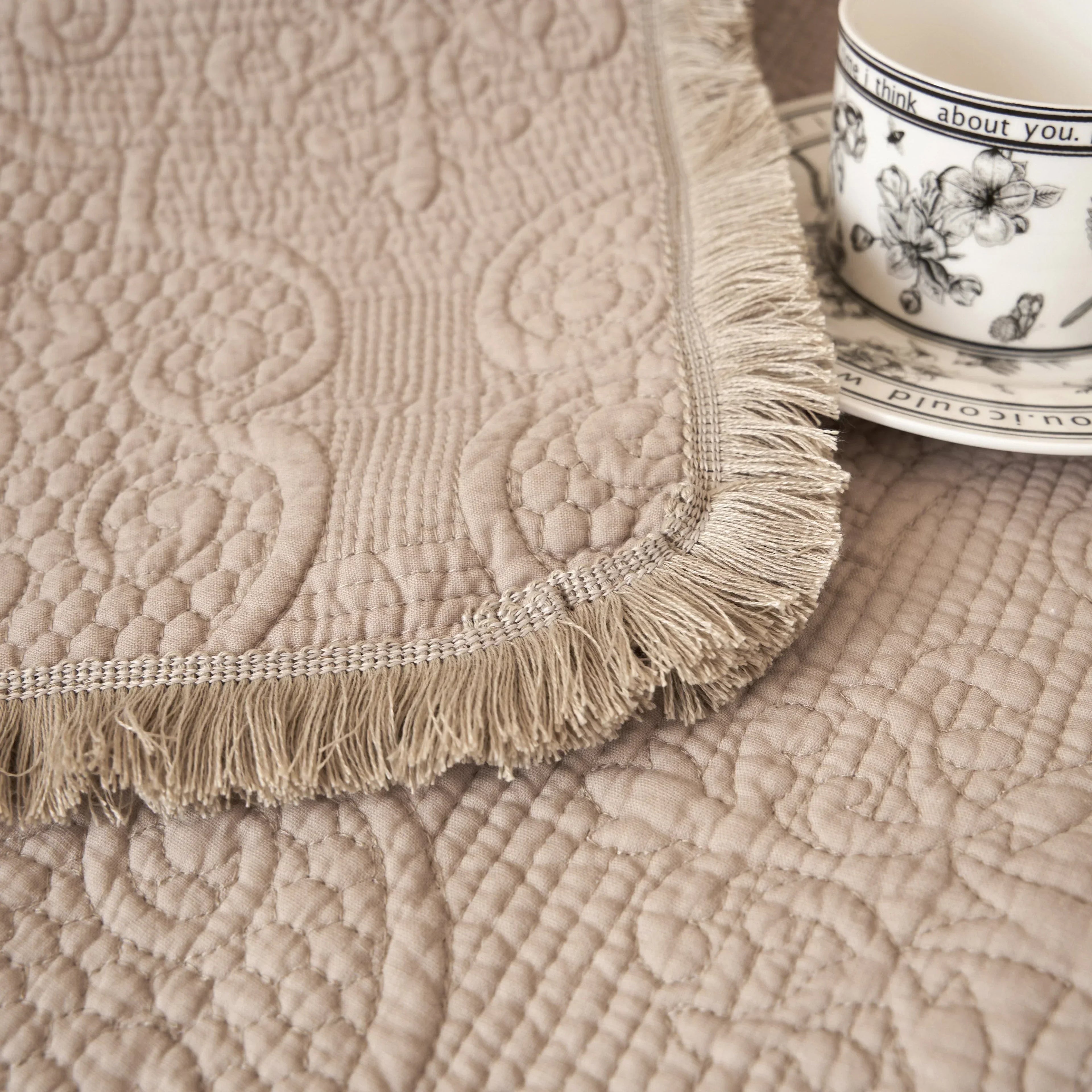 DaDa Bedding Elegant Fringed Cotton Quilted Throw Blanket - Luxurious Solid Soft Paisley Pattern, Cozy Lightweight Lap Throw, Perfect for Couch or Bed, Neutral Sandy Taupe Tan Beige, 50x60 Inches DaDalogy Bedding Collection