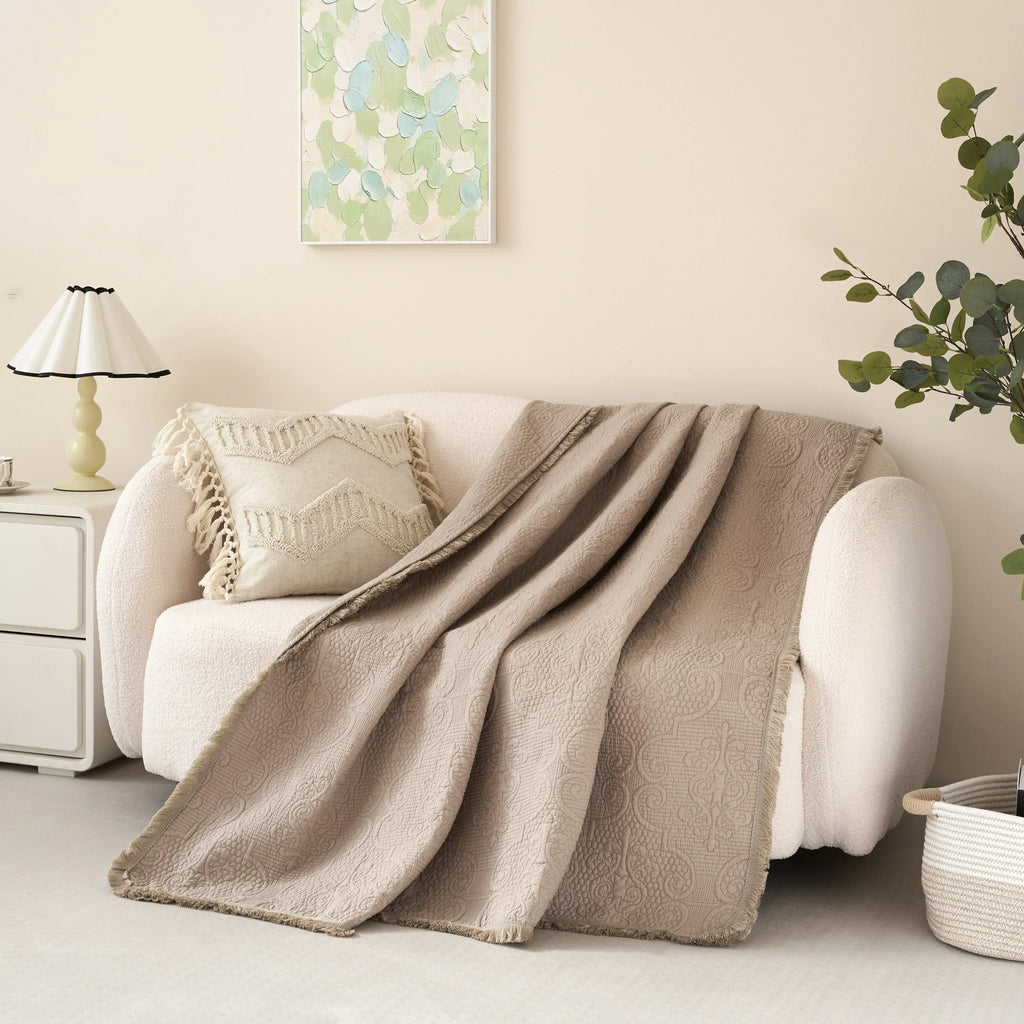 DaDa Bedding Elegant Fringed Cotton Quilted Throw Blanket - Luxurious Solid Soft Paisley Pattern, Cozy Lightweight Lap Throw, Perfect for Couch or Bed, Neutral Sandy Taupe Tan Beige, 50x60 Inches DaDalogy Bedding Collection