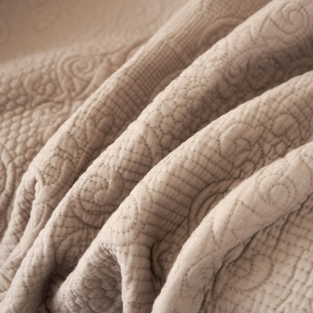 DaDa Bedding Elegant Fringed Cotton Quilted Throw Blanket - Luxurious Solid Soft Paisley Pattern, Cozy Lightweight Lap Throw, Perfect for Couch or Bed, Neutral Sandy Taupe Tan Beige, 50x60 Inches DaDalogy Bedding Collection