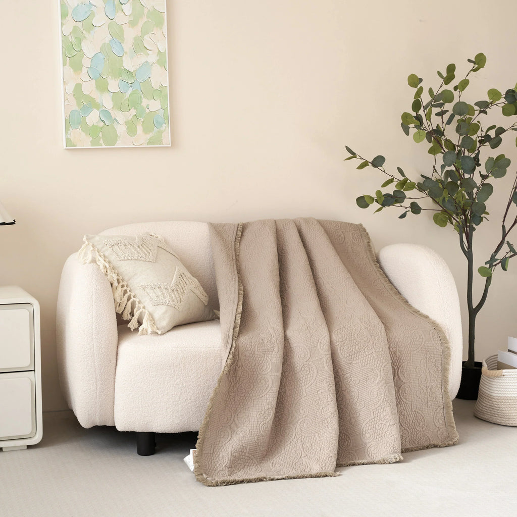 DaDa Bedding Elegant Fringed Cotton Quilted Throw Blanket - Luxurious Solid Soft Paisley Pattern, Cozy Lightweight Lap Throw, Perfect for Couch or Bed, Neutral Sandy Taupe Tan Beige, 50x60 Inches DaDalogy Bedding Collection