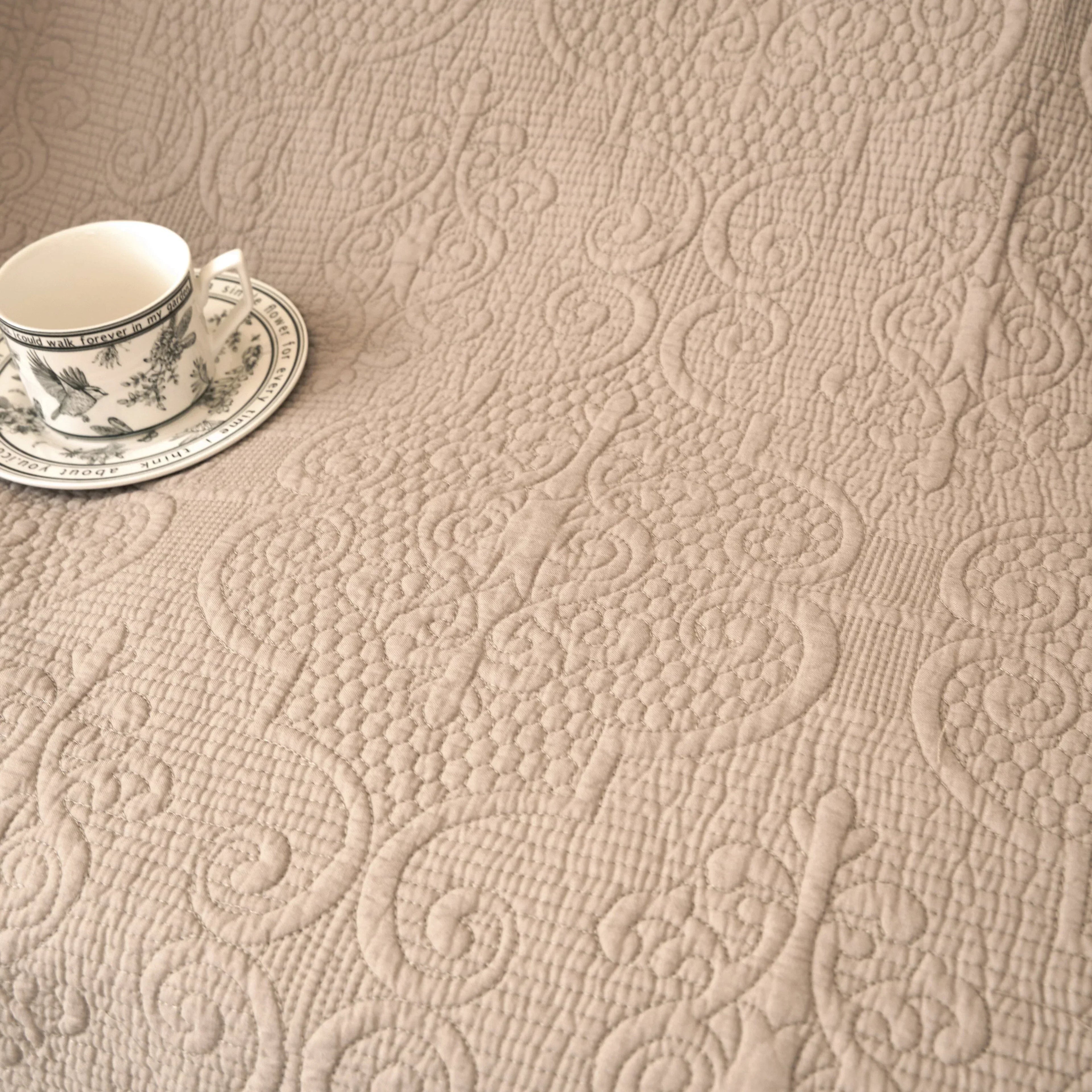 DaDa Bedding Elegant Fringed Cotton Quilted Throw Blanket - Luxurious Solid Soft Paisley Pattern, Cozy Lightweight Lap Throw, Perfect for Couch or Bed, Neutral Sandy Taupe Tan Beige, 50x60 Inches DaDalogy Bedding Collection