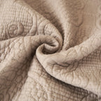 DaDa Bedding Elegant Fringed Cotton Quilted Throw Blanket - Luxurious Solid Soft Paisley Pattern, Cozy Lightweight Lap Throw, Perfect for Couch or Bed, Neutral Sandy Taupe Tan Beige, 50x60 Inches DaDalogy Bedding Collection