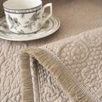DaDa Bedding Elegant Fringed Cotton Quilted Throw Blanket - Luxurious Solid Soft Paisley Pattern, Cozy Lightweight Lap Throw, Perfect for Couch or Bed, Neutral Sandy Taupe Tan Beige, 50x60 Inches DaDalogy Bedding Collection