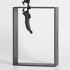 Black metal dancer statue featuring two human figures on a rectangular frame ideal for art lovers and ballet enthusiasts