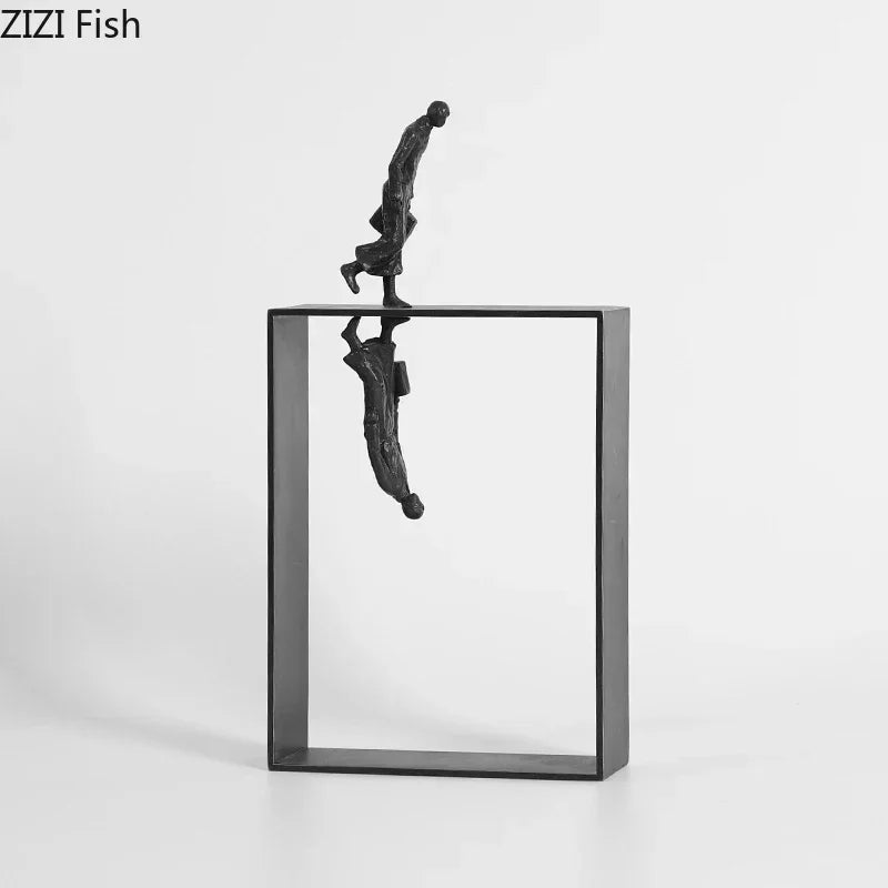 Black metallic dancer statue balancing on open rectangular frame with mirrored reflection for art lovers and ballet enthusiasts