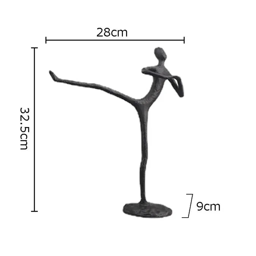 Black metal desk statue of a dancer in an elegant pose with modern design ideal for home office decor