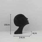 Black matte finished modern metal desk statue with sleek minimalist design ideal for home office decor