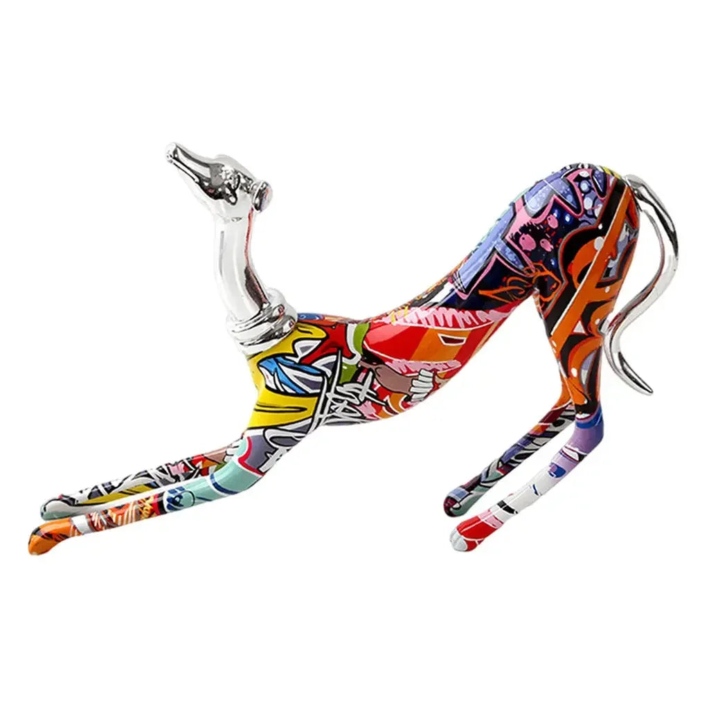 Vibrant graffiti-style metallic greyhound figurine featuring bold colorful patterns as a decorative living room doberman statue piece