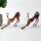 Doberman statue decorative piece featuring two vibrant graffiti-style dog figurines with metallic silver heads ideal for living room decor